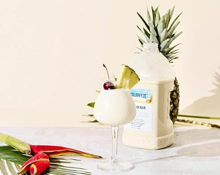 Coolbreeze Beverages Ready to Use Premium Frozen Slush Drink Mix - Pina Colada - One Case (Six 1/2 Gal Bottles)